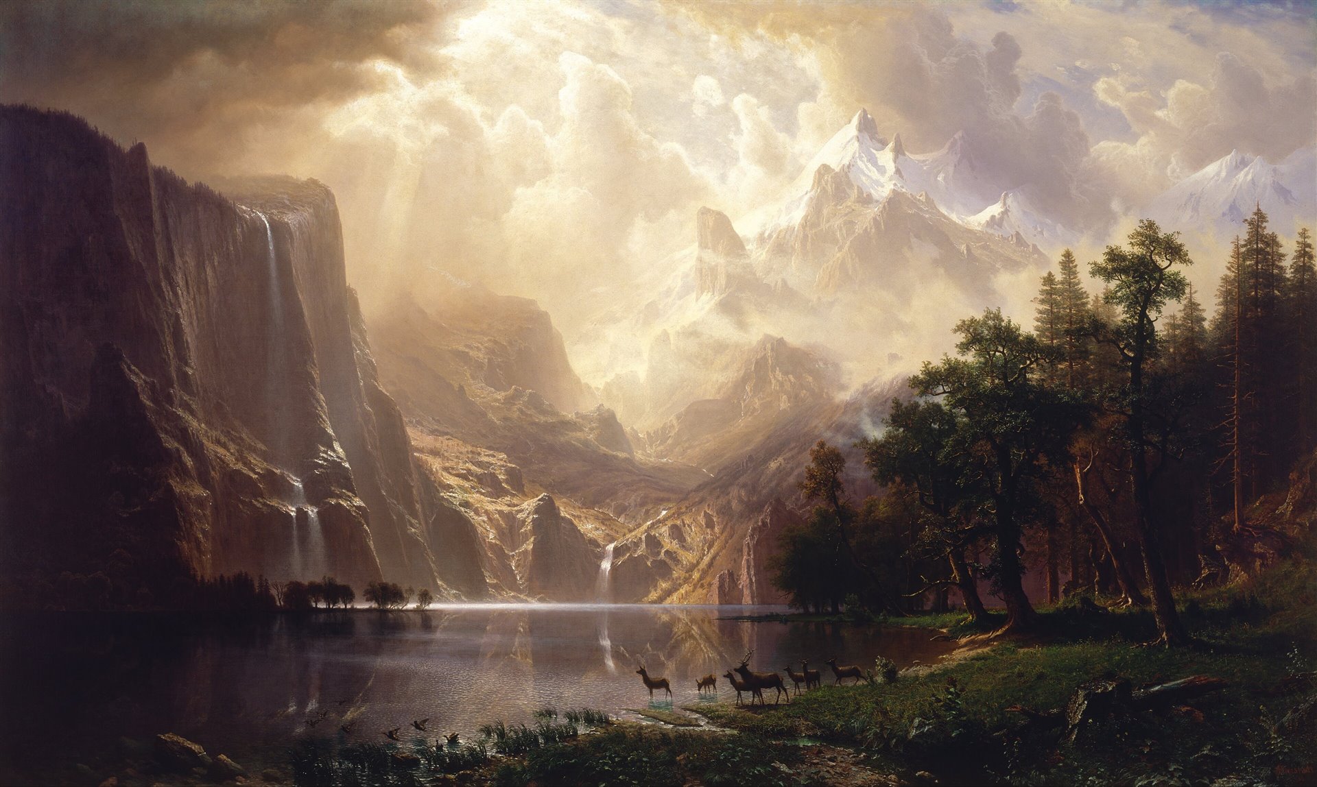 Albert Bierstadt’ın Sierra Nevada dağları arasında göl manzarası.